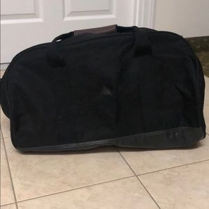 Burton duffle bag with leather snap clasp